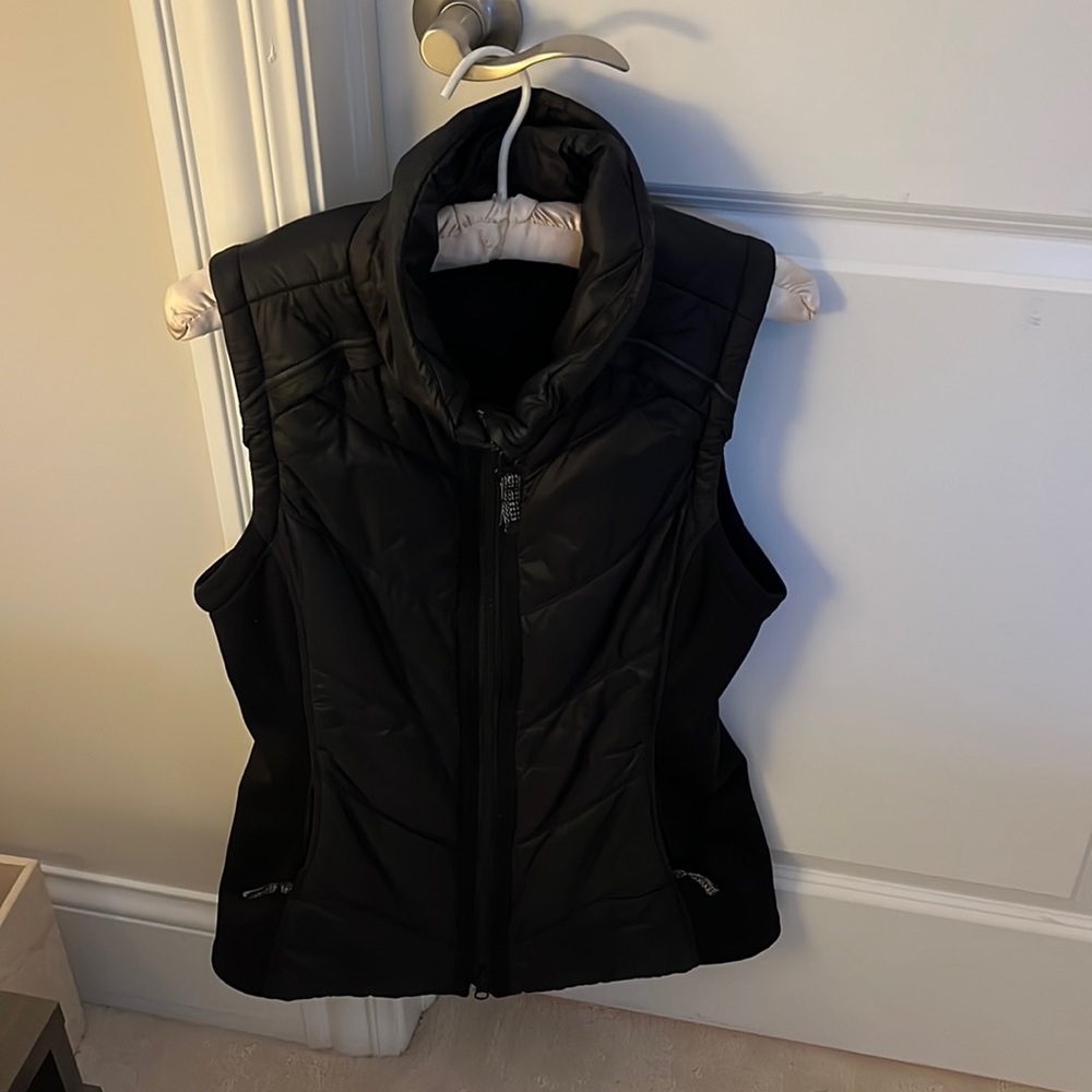 Black Athleta vest:  puffer front and back with viscose on the sides.